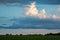 Thunderhead clouds over pasture