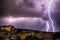 Thunderhead and Lightning Over City