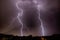 Thunderhead and Lightning Over City