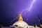 A thunderstorm above Bouddnath stupa. Lightning discharge strike are visible