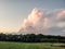 Thunderstorm building in the sky over Nebraska land