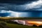 A thunderstorm is coming in the fields of South Africa. The storm is coming