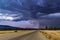 Thunderstorm heavy dark blue sky with clouds hard rain in the horizon