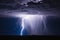 Thunderstorm lightning bolts at night
