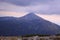 Thunderstorm and a mountain background