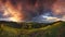 Thunderstorm In The Mountains. Panoramic Summer Landscape With Enchanting Stormy Sky, Storm Clouds, Sunny Valley And Small Rural H