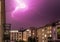 Thunderstorm in the night: Lightning on the sky, urban city, 