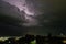 A thunderstorm in the night sky is a majestic and breathtaking sight of nature.