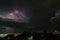 A thunderstorm in the night sky is a majestic and breathtaking sight of nature.