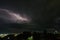 A thunderstorm in the night sky is a majestic and breathtaking sight of nature.