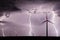 Thunderstorm over a wind farm representing renewable energy