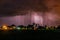 Thunderstorm with rain over the village street