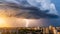 Thunderstorm with storm and lightning over the city