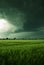 Thundery clouds over a field