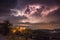 Thunterstorm with lightning above village at night