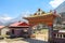 Thyangboche Monastery`s entrance with Ama Dablam an Lhotse mountain peaks in the background