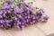 Thyme branches on wooden background