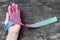 Thyroid Cancer Awareness ribbon in Teal Pink Blue color on helping hand