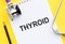 THYROID. Text write on medical notebook with stethoscope