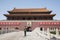 Tiananmen Square, Gate of Heavenly Peace with Mao\'s Portrait and guard, Beijing, China.