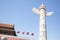 Tiananmen Square, Gate of Heavenly Peace with ornamental pillar, Beijing, China.