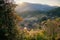 Tianluokeng Tulou cluster behind the trees during the sunset, Fujian, China