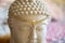 Tiara with gemstone on Buddha statue head