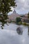 Tiber River in Rome, Italy: view of bridge Sant`Angelo and on background Saint Peter`s Basilica.