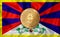 Tibet flag  ethereum gold coin on flag background. The concept of blockchain  bitcoin  currency decentralization in the country.