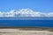 Tibet, lake Nam-Tso Nam Tso and Nyechen Tangla mountain ridge in sunny day