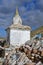 Tibet. Whate stupa and buddhist prayer stones with mantras and ritual drawings on the trail from the town of Dorchen around mount