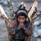 Tibetan Boy with basket of firewoods, Nepal