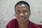 Tibetan Buddhist monk in the monastery of Tiksey in Ladakh. India. Close up