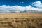 Tibetan highlands and distant snowy mountains near Daotanghe cit