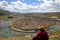 A Tibetan monk overlooking the Yarchen Gar Yaqen Orgyan Temple