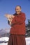 Tibetan Monk pets cat at Tibetan Monastery in Woodstock New York