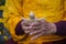 Tibetan monk sculpts figure of the deity barley flour tsampa in Nepal