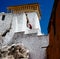 Tibetan Monk is on the wall of Buddhist Monastery in Leh, Ladakh, North India