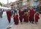 Tibetan Nuns Walking Around Boudhanath Stupa