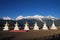 Tibetan Pagoda with Meili Snow Mountains