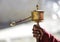 Tibetan Prayer wheel in the hand