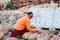 Tibetan rock painting artist