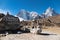 Tibetan stone cairns, prayer flags & rock with carved mantra `Six Syllables of Clairvoyance`, Thukla Pass, Everest Base Camp trek