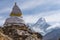 Tibetan style stupa and Ama Dablam mountain