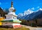 Tibetan white tower at Four Girls Mountain