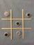 Tic Tac Toe game made with sticks and magnets