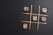 Tic tac toe game with sushi on dark black background, creative concept sushi rolls. Banner, playing tic tac toe game