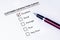 Tick placed in excellent check box on customer service satisfaction survey form with a pen on isolated white background. Business