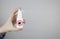 Tick repellant. Insect protection. Girl holds a spray on a white background that will protect against ticks. Repelling blood-