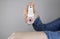 Tick repellant. Insect protection. Girl holds a spray on a white background that will protect against ticks. Repelling blood-